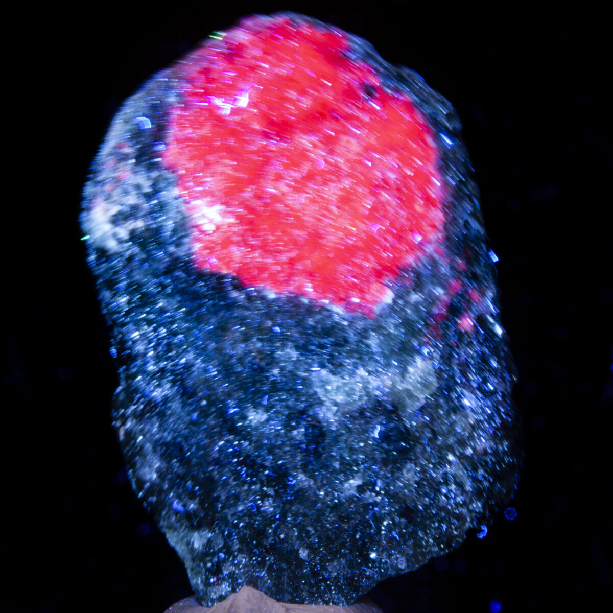 Corundum var. Ruby (Fluorescent) in Zoisite