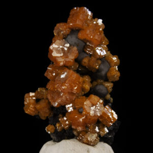 Orange-red vanadinite crystals on botryoidal goethite from Mibladen, Morocco