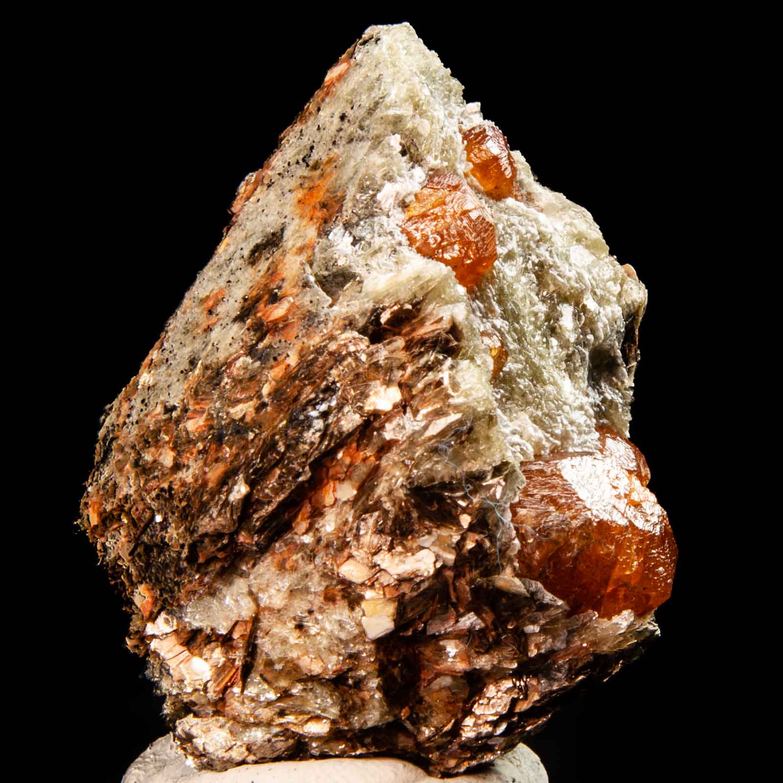 Spessartine Garnets in Mica