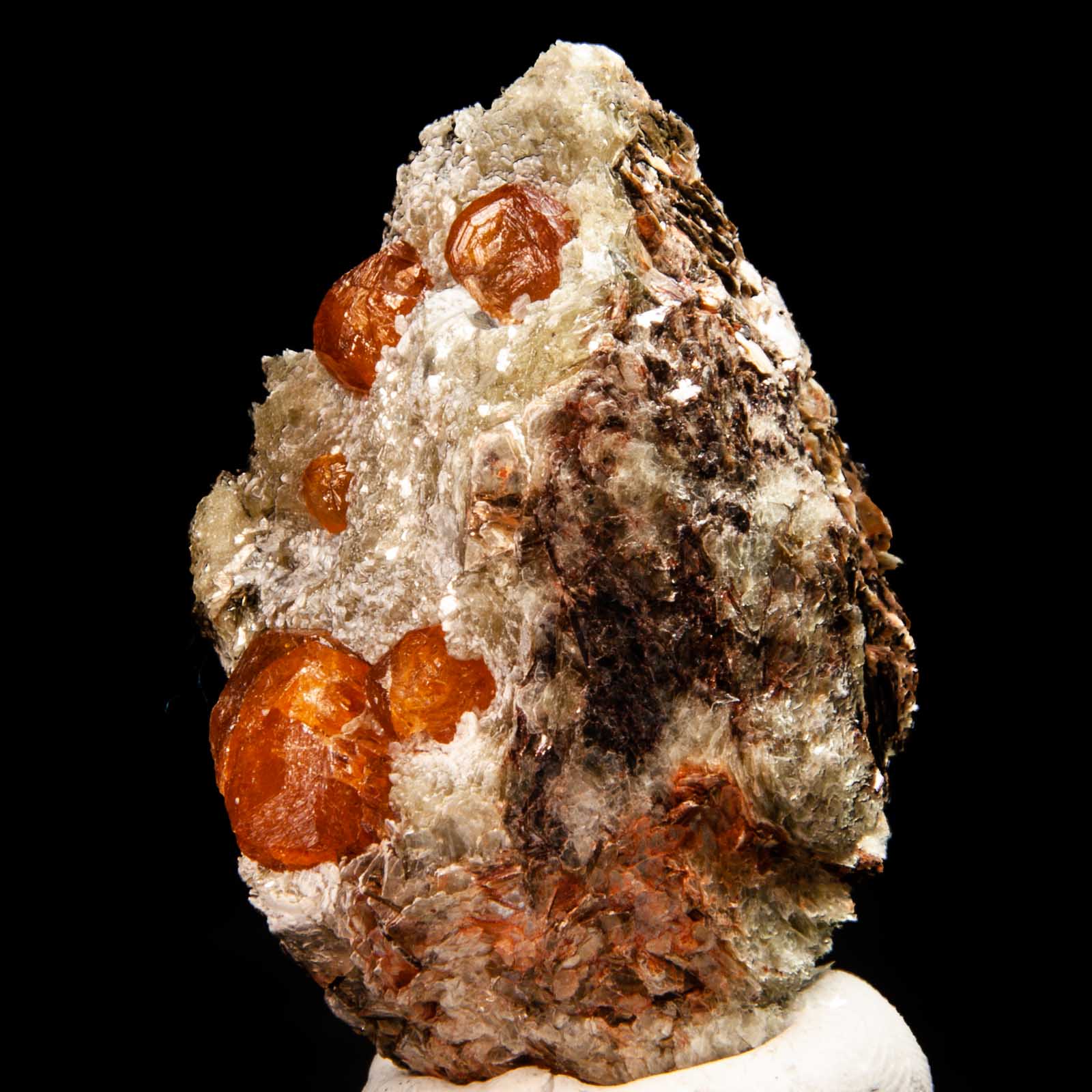 Spessartine Garnets in Mica
